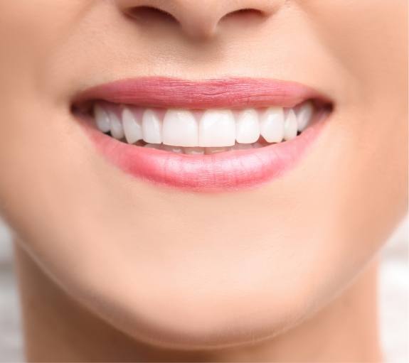 Close up of smile with straight white teeth